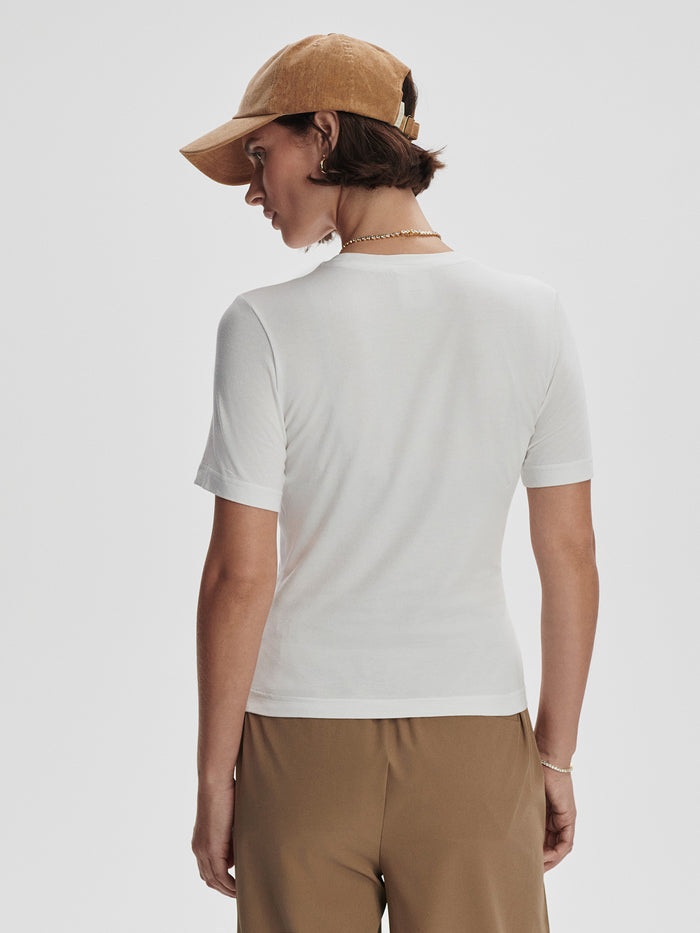 White|Front view of the Varley Regina Fitted Tee in White, a soft cotton tee with a slim, fitted silhouette.