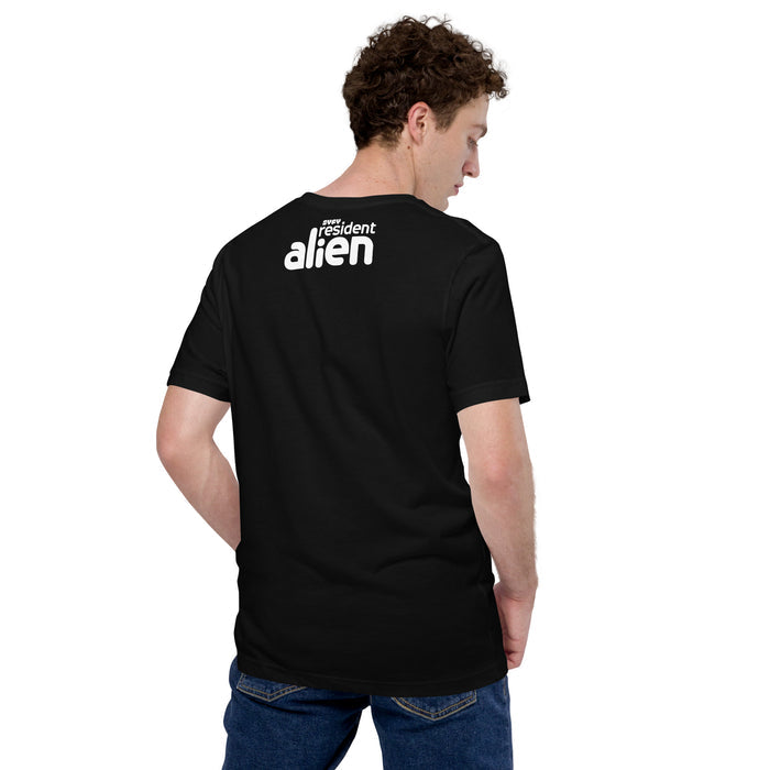 Resident Alien comedy series t-shirt flat lay