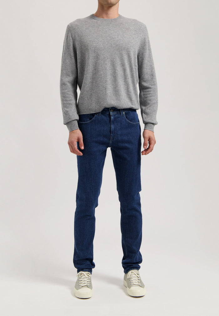 Sustainable MUD Jeans in dark blue denim, crafted ethically from organic cotton, featuring classic design and fit.
