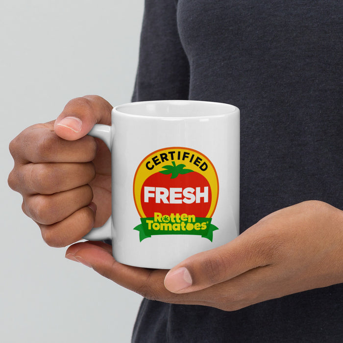 Close-up of the red and green Rotten Tomatoes Certified Fresh graphic printed on the ceramic mug