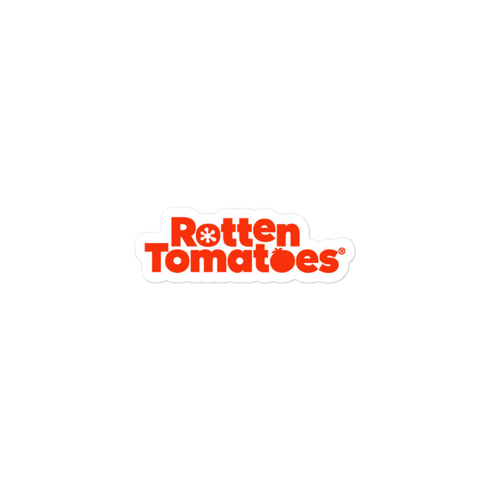 Rotten Tomatoes logo sticker displayed on a laptop surface for scale and style