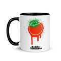 Rotten Tomatoes white ceramic mug featuring a black handle, black inner bowl, and a black splatter logo design on the front