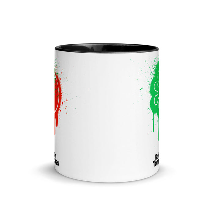 Front-facing view of the Rotten Tomatoes two-tone mug highlighting the signature movie review splatter graphic