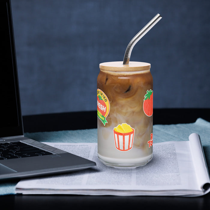 Top-angle view of the Rotten Tomatoes 16 oz glass showing the included lid and straw ready for favorite beverages