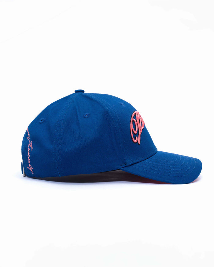 Blue cap with pink logo on a white background