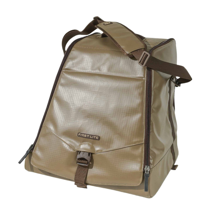 Walnut First Lite gear bag with a padded shoulder strap, dark brown zippers, and a front buckle pocket.