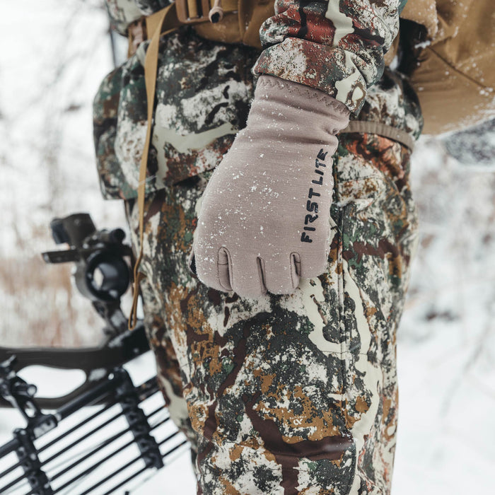 Taupe First Lite glove with 'FIRST LITE' text and snowflakes.