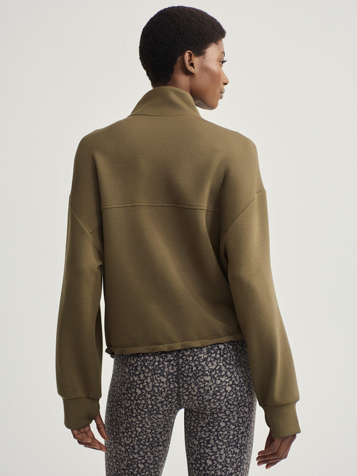 Dark Olive|SIAN Cropped Half Zip Midlayer in Dark Olive, cropped silhouette with a half-zip neckline, versatile outdoor midlayer.