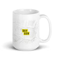 Angle view of the 15 oz Snapped logo ceramic mug
