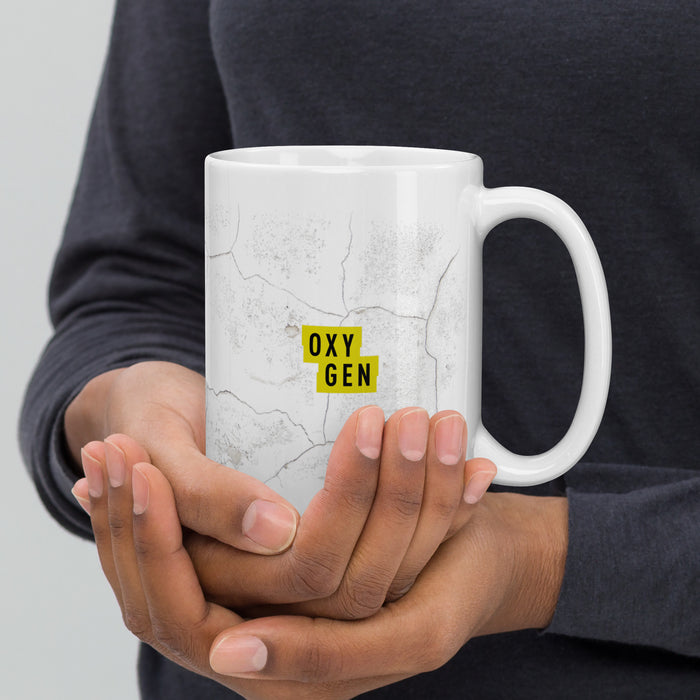 Detailed view of the Snapped logo imprint on the white mug