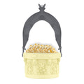 Front view of the Snow White wishing well popcorn bucket featuring classic fairy tale graphics
