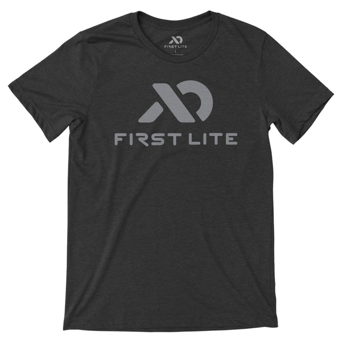 Dark heather grey t-shirt with alight grey  First Lite logo and text on the front.