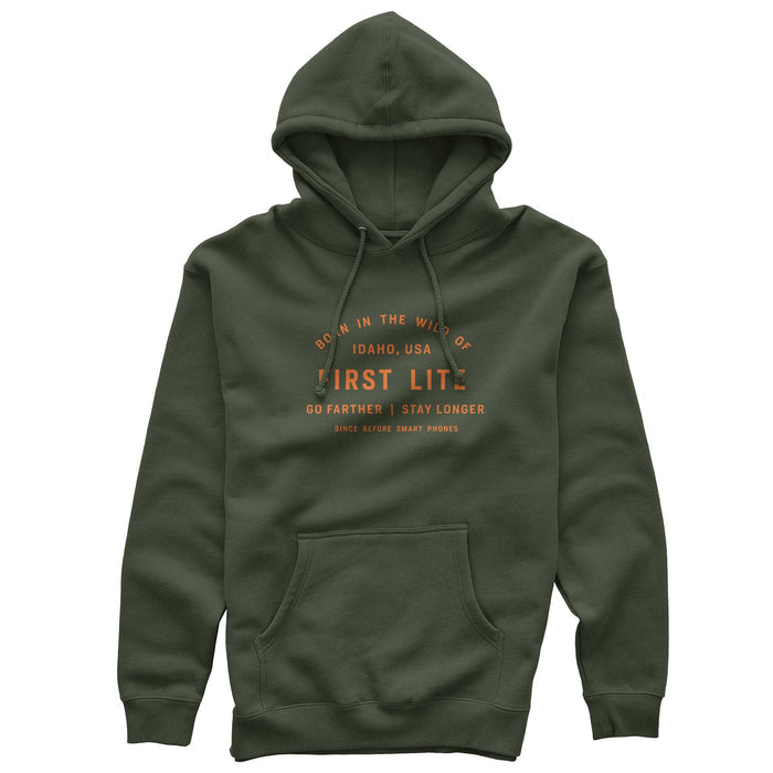 Olive green hoodie with orange text on the front saying 'Born in the wild of Idaho, USA, First Lite, Go farther | Stay longer, Since before smart phones', a drawstring hood, and a kangaroo pocket.