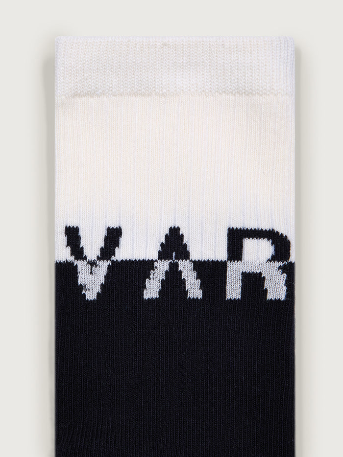 Black/ Egret|Stellar Colourblock Sock in Black and Egret, front view showcasing a colour-block knit design.