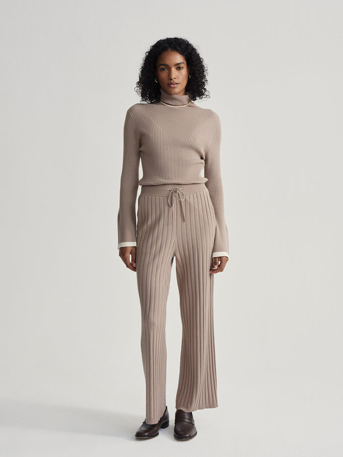 Fungi|Simeon wide rib knit trouser in Fungi, front view with a relaxed fit and prominent wide rib knit texture.