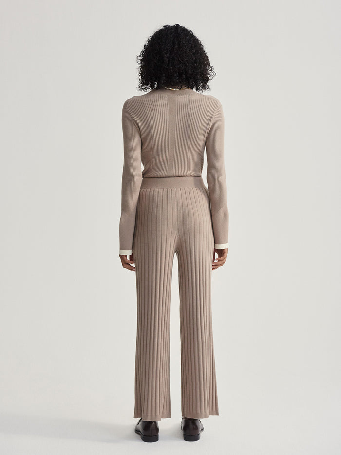Fungi|Front view of the Simeon Wide Rib Knit Trouser in fungi, featuring a relaxed wide-leg silhouette and soft rib-knit fabric.