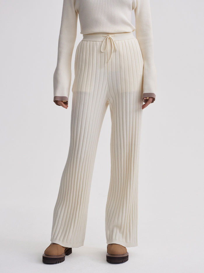 Egret|Front view of the Simeon Wide Rib Knit Trouser in Egret, light cream color, featuring a relaxed wide-leg silhouette with rib-knit texture.