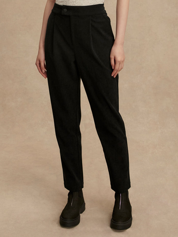Black|Cohen Reg Tapered Leg Pant 29 in black, Needle Cord fabric with pockets, regular rise, back elastic waistband, tapered fit.