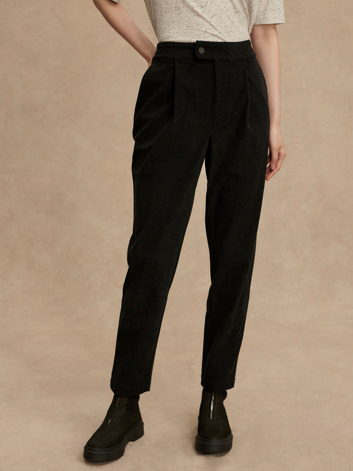 Black|Front view of Cohen Reg Tapered Leg Pant 27 in Black, Needle Cord fabric with regular rise, tapered fit, elasticated back waistband and pockets.