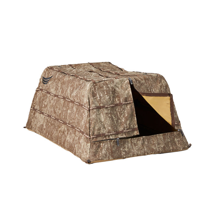 Brown and tan camouflage hunting blind with an open zippered entrance revealing a tan interior and Tanglefree branded straps.