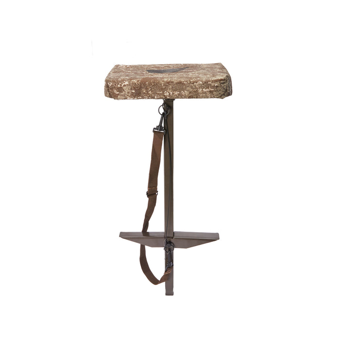 Portable hunting stool with a desert camo padded seat, olive drab central pole, cross-shaped base, and brown carrying strap.