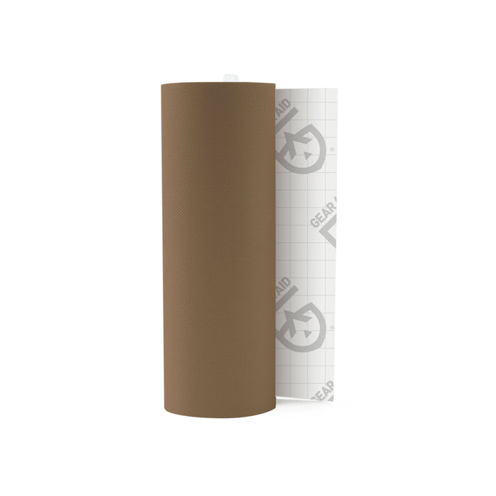Brown textured repair tape roll with white grid backing showing 'GEAR AID' logo.