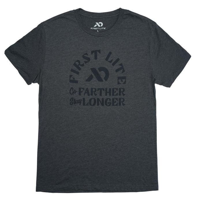 Charcoal heather t-shirt with a dark gray "FIRST LITE GO FARTHER STAY LONGER" graphic on the front.