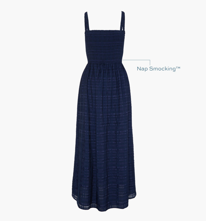 Image of a Nap Dress with text highlighting it's Nap Smocking™ color: Navy Sheer Plaid