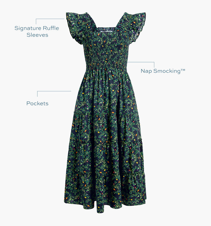 Image of a Nap Dress with text highlighting it's Nap Smocking™ color: Midnight Garden Poplin