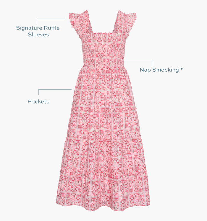 Image of a Nap Dress with text highlighting it's Nap Smocking™ color: Red Patchwork Doily Heart