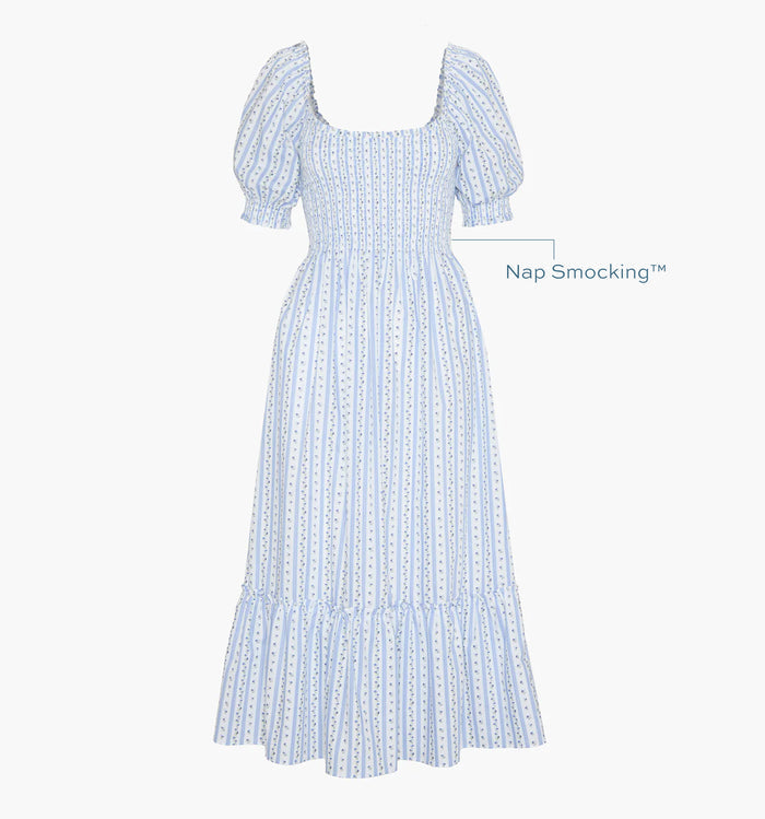 Image of a Nap Dress with text highlighting it's Nap Smocking™ color: Blue Petal Stripe