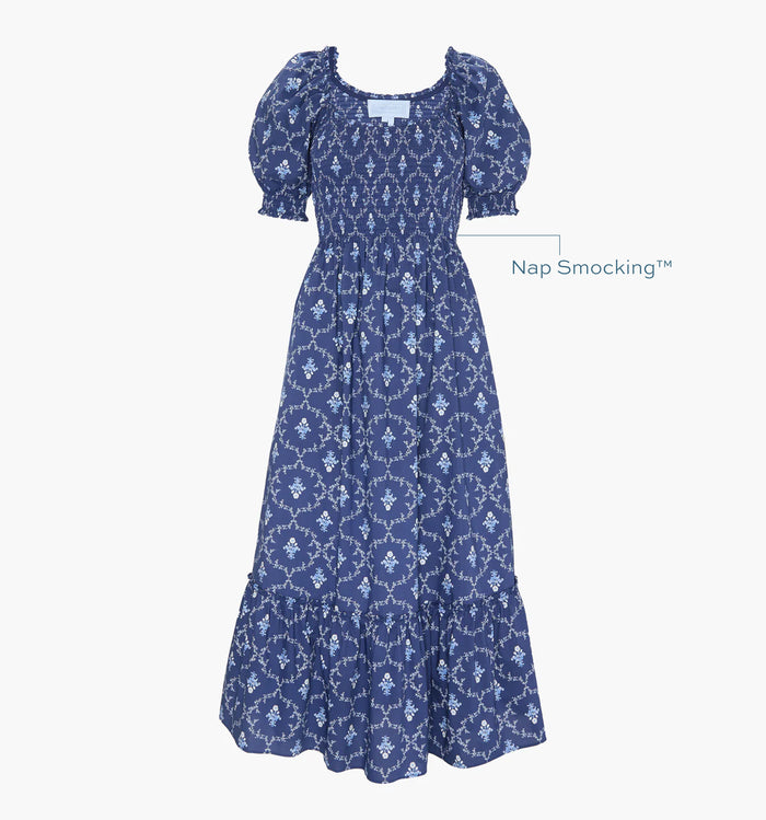 Image of a Nap Dress with text highlighting it's Nap Smocking™ color: Navy Trellis