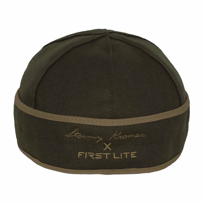 Dark green wool hat with tan trim and "Stormy Kromer X First Lite" embroidered in tan on the front.