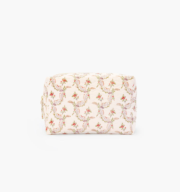 The Quilted Cosmetic Bag in Pink Ribbon Rose Ikat color: Pink Ribbon Rose Ikat