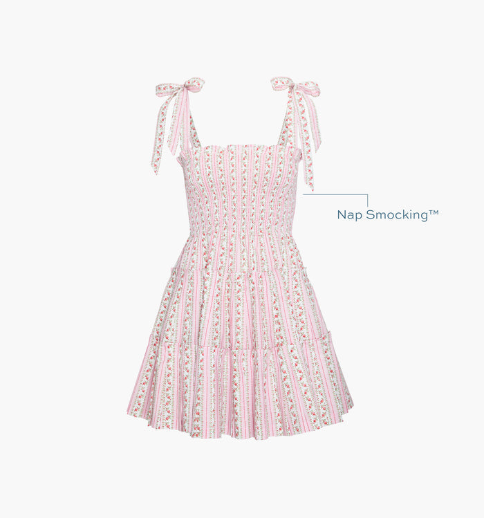 Image of a Nap Dress with text highlighting it's Nap Smocking™ color:  Pink Floral Dot Stripe