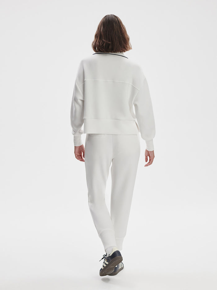 White|Slim Cuff Pant in White, front view highlighting the slim ankle cuff detail and clean silhouette.