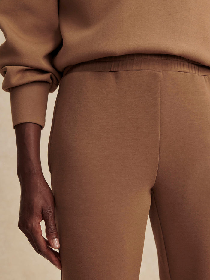 Golden Bronze|The Slim Cuff Pant 25 Golden Bronze, full-length product image showing a slim-fit pant with a tapered cuff in golden-bronze fabric.