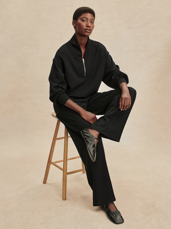 Black|Front view of Varley The Wide Leg Pant in Black, size 28, featuring a relaxed wide-leg silhouette.