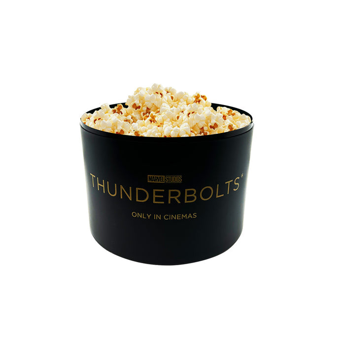 Close-up view of the Thunderbolts* branding and tin and plastic construction on the collectible bucket