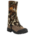 Camouflage hunting gaiter with an orange First Lite logo, side closure, and underfoot strap, shown on a brown hiking boot.