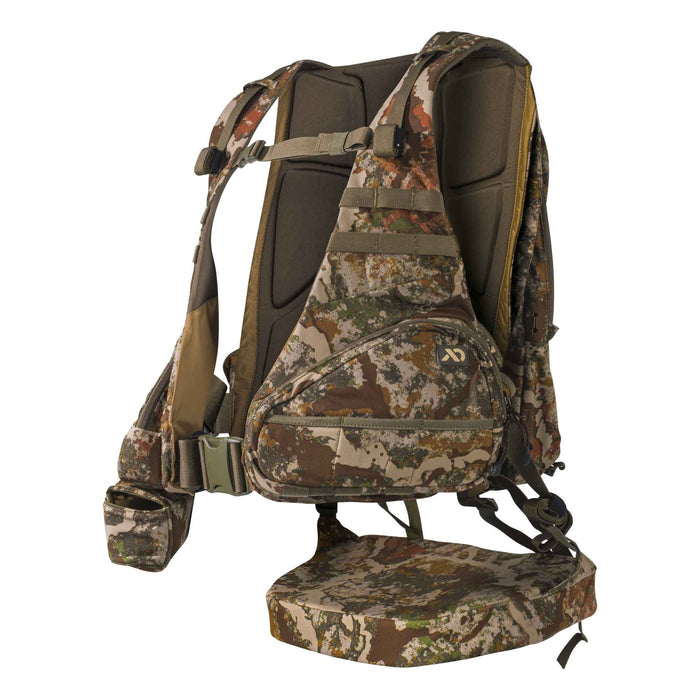 Multi-colored camouflage hunting pack featuring a padded back, large front pouch, and an integrated fold-down seat.