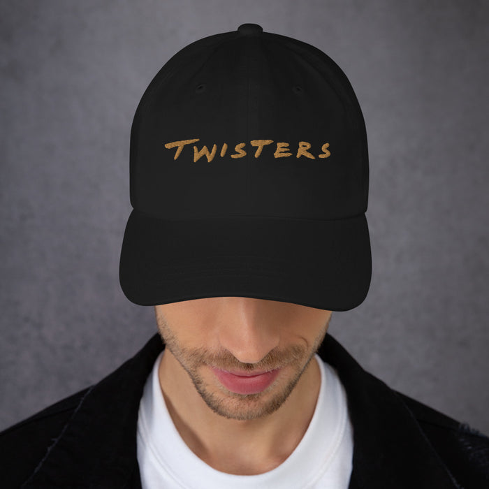 Front close-up of the black Twisters dad hat embroidery and curved brim