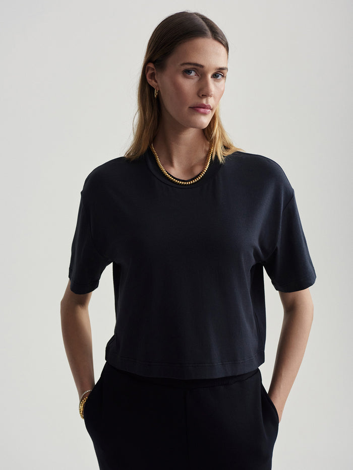 Black|Front-view of the Venice Easy Tee in Black by Varley, a relaxed-fit crew-neck T-shirt in soft cotton jersey.