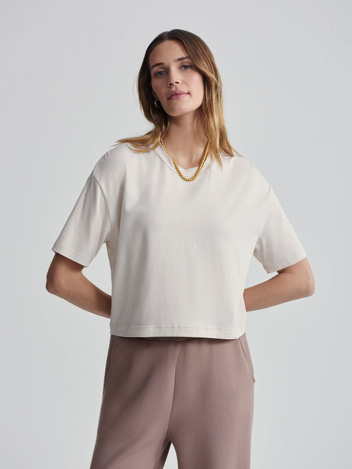 Oatmeal|Venice Easy Tee Oatmeal on a model, front view; a relaxed-fit short-sleeve tee in soft oatmeal color.