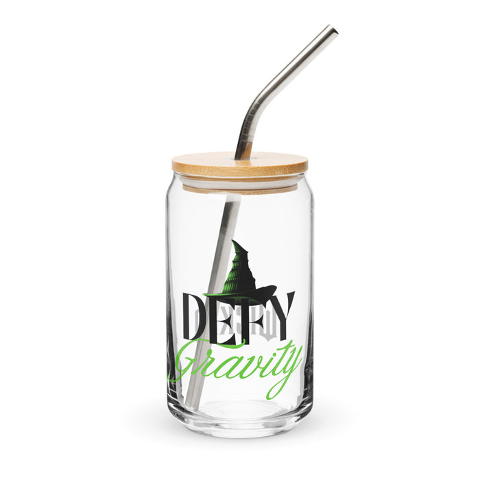 Can-shaped glass featuring the Wicked Defy Gravity theme, complete with lid and straw against a neutral background