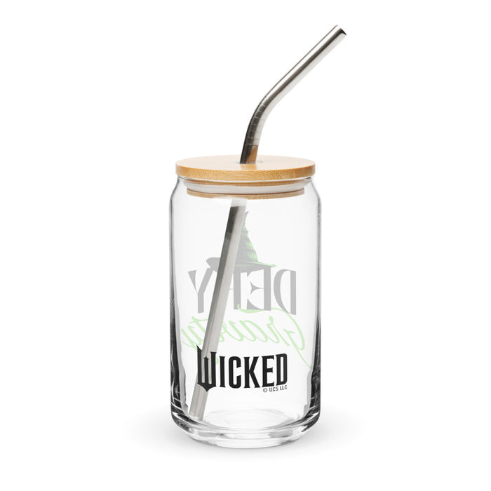 Close-up of the Wicked glass highlighting the printed Defy Gravity lettering and artwork detail
