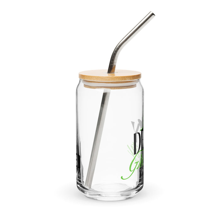 Angle shot of the can-shaped glass with the included lid and straw attached