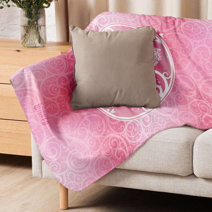 Folded Wicked sherpa blanket draped over a living room armchair