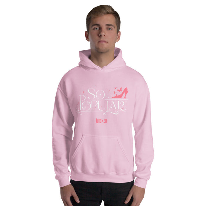 Close-up of the fabric texture and cuffs on the light pink hoodie