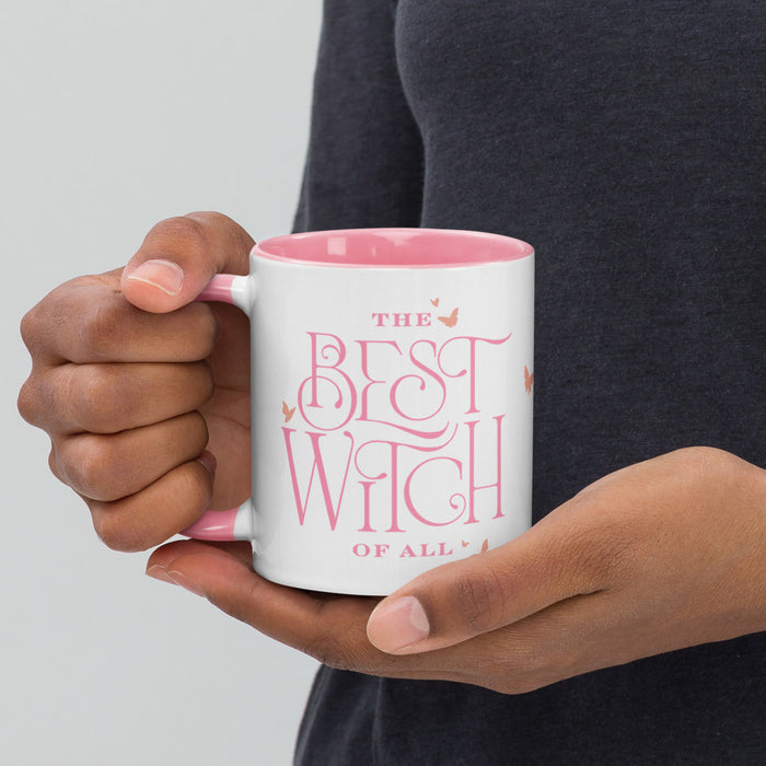Side angle view of the ceramic mug highlighting the colored handle and interior